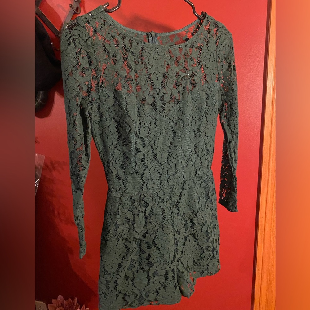 BB Dakota. Size 2 romper in dark green. Lightly worn.